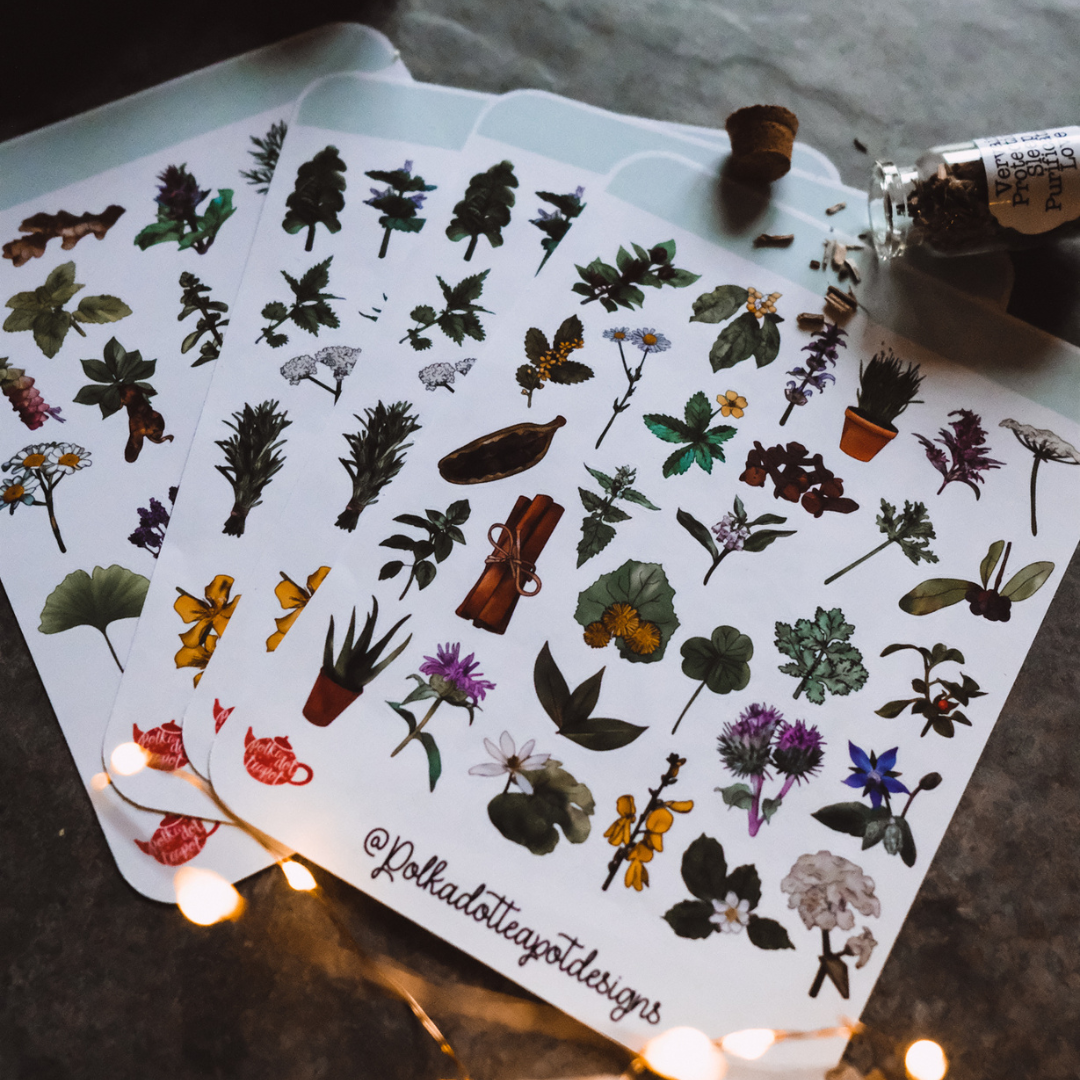 Botanical herb sticker sheets designed by Polka Dot Teapot Designs displayed with warm lighting and natural styling